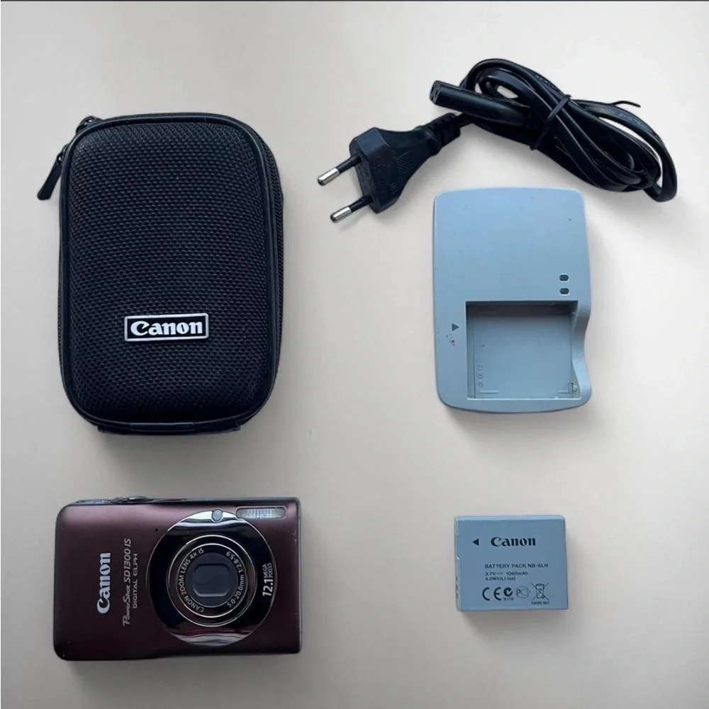 Canon Powershot SD1300 IS Elph burgundy Camera w Battery, Case, Charger tested